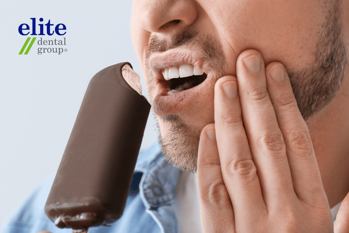 Man having sensitive teeth when eating cold foods | Root Canal Treatment Man having sensitive teeth when eating cold foods | Root Canal Treatment