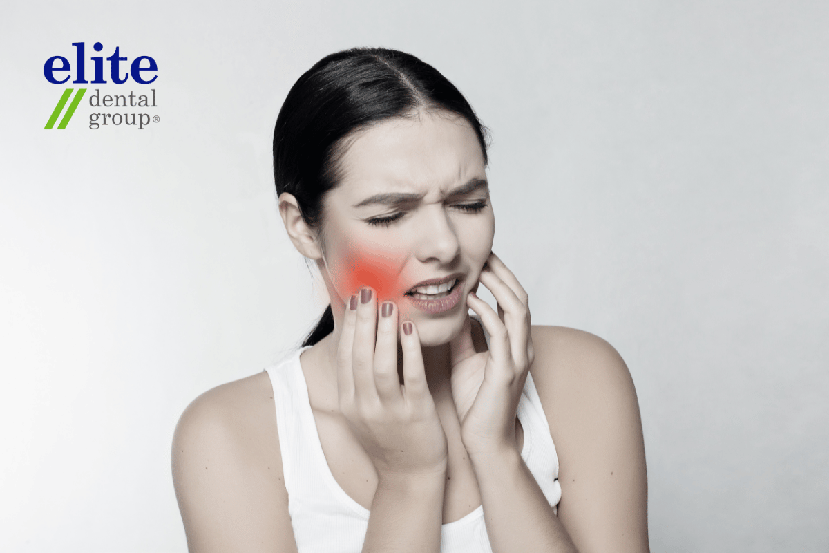 Woman experiencing discomfort and pain | Root Canal Treatment 